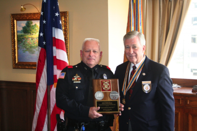 Silver Patrick Henry Award presented to Officer Gregory Stevens, Garland Police Department, for Stopping Terrorists Attack in Garland 2015 Presented by Capt Paul Brown