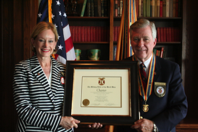 Justice Lana Myers presents reframed Dallas Chapter Charter to Capt Paul Brown