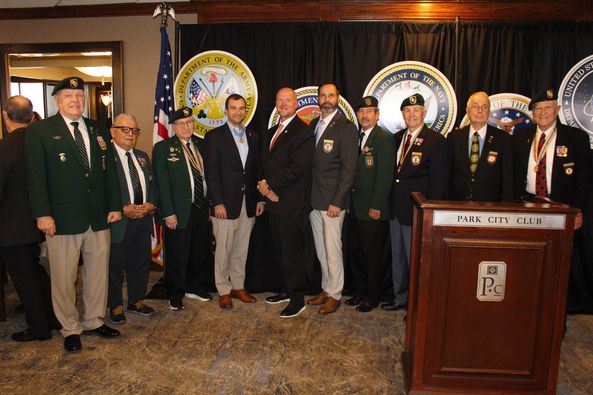 What Happens at a Military Veterans Organization Meeting in Dallas?